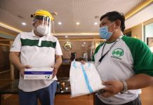 āPOWER OF GIVINGā | MORE donates rapid COVID-19 test kits to Iloilo On behalf of the Iloilo City government, Mayor Jerry TreƱas (left) receives from MORE Electric and Power Corp. president Roel Castro rapid test kits for COVID-19 and personal protective equipment for healthcare frontliners.