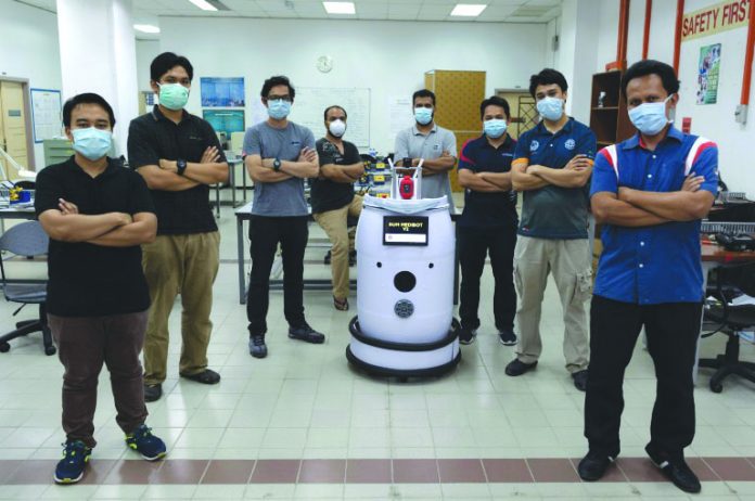 Medibot in Malaysia 'Medibot' is mounted with a camera and screen via which patients can communicate remotely with medics. AFP