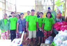 Member-agrarian reform beneficiaries (ARB) of the Nazareth Farmworkers Association in Barangay Purisima, Manapla, Negros Occidental prepare essential goods and financial aid to be distributed to its members and other ARBs in their area on March 26. They are one of the ARB organizations in this province to do so amid the coronavirus disease 2019 pandemic. DAR NEGROS OCCIDENTAL I-NORTH