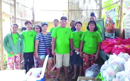 Member-agrarian reform beneficiaries (ARB) of the Nazareth Farmworkers Association in Barangay Purisima, Manapla, Negros Occidental prepare essential goods and financial aid to be distributed to its members and other ARBs in their area on March 26. They are one of the ARB organizations in this province to do so amid the coronavirus disease 2019 pandemic. DAR NEGROS OCCIDENTAL I-NORTH