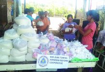 Cadiz agrarian coop gives food packs to folks affected by COVID Members of the San Juan Torena Agrarian Reform Cooperative in Barangay Caduha-an, Cadiz City, Negros Occidental distribute relief packs to its members and other agrarian reform beneficiaries from neighboring villages affected by the coronavirus disease 2019 outbreak. The organization aims to be a great part of the community while people are coping back in life amid the present crisis. PIA