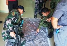 Reds attack gov’t troops in Lambunao Police Colonel Paul Kenneth Lucas (left), director of the Iloilo Police Provincial Office, traces the treat path of rebels who attacked Philippine Army troops in Barangay Panuran, Lambunao, Iloilo on April 7, 2020. IAN PAUL CORDERO/PN