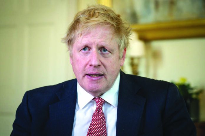Prime Minister Boris Johnson Prime Minister Boris Johnson (picture after he was discharged from hospital on April 12) is expected to return to work Monday after recovering from the coronavirus. 10 DOWNING STREET/AFP