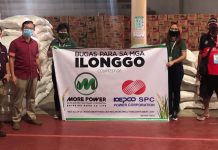 ‘Rice for the Ilonggos’ The Iloilo City government represented by Executive Assistant Francis Cruz (second from left) accepts from MORE Electric and Power Corp. president Roel Z. Castro (extreme left) a donation of 30 sacks of rice. MORE Power previously donated facemasks, alcohol, sanitizers, and food packs to frontliners in Iloilo City battling the spread of the coronavirus disease 2019.