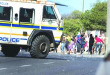 S. Africans clash with cops over food aid South African police clashed with Cape Town township residents protesting over access to food aid during a coronavirus lockdown. AFP