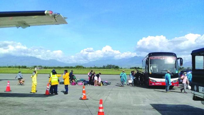 Stranded Negrenses in Manila due to travel restrictions imposed to suppress the spread of coronavirus disease 2019 return in this province on April 22. The group, who will be undergoing a 14-day mandatory quarantine in E.B. Magalona town, includes 28 females, 18 males, two toddlers and an infant. RICHARD MALIHAN