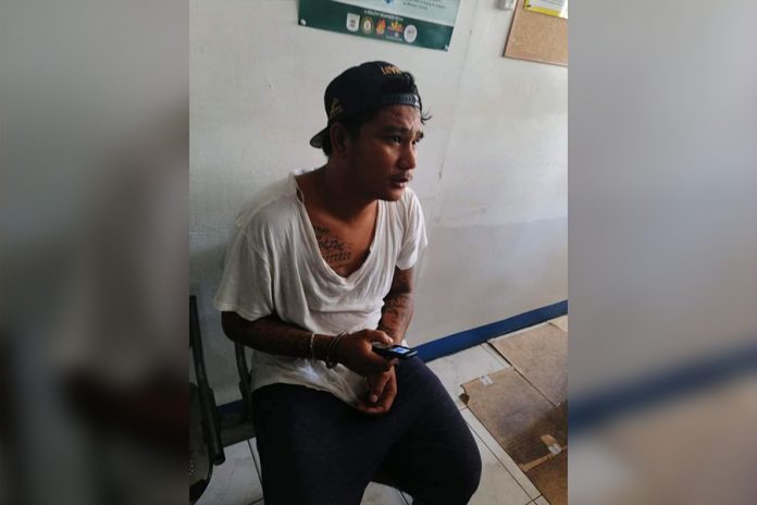 Theft suspect Gerald Martinez Theft suspect Gerald Martinez sits handcuffed inside the headquarters of Iloilo City Police Office Station 1. He was caught stealing a belt bag containing cash from a television reporter in Barangay President Roxas, City Proper on Tuesday. ICPO