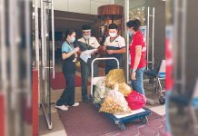 Healthcare workers of the Antique Medical Center, Inc. in San Jose town receive locally produced vegetables from their provincial government on May 1. The provincial government here will purchase P15 million worth of test kits for frontliners in the fight against coronavirus disease 2019. JASON ALAGOS