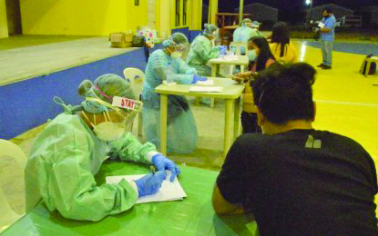 Nurses at the Provincial Healting Center in E.B. Magalona, Negros Occidental cater the overseas Filipino workers who underwent a 14-day mandatory quarantine for coronavirus disease 2019 upon their arrival on April 14. PIO NEGROS OCCIDENTAL