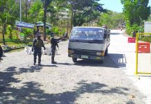 Antique ambulance driver nabbed for transporting liquor amid GCQ Police personnel conduct quarantine checkpoint at the border of Barangay Fabrica, Hamtic, Antique. An ambulance driver was arrested there on May 7 for transporting nine boxes of liquor. PNP HAMTIC ANTIQUE
