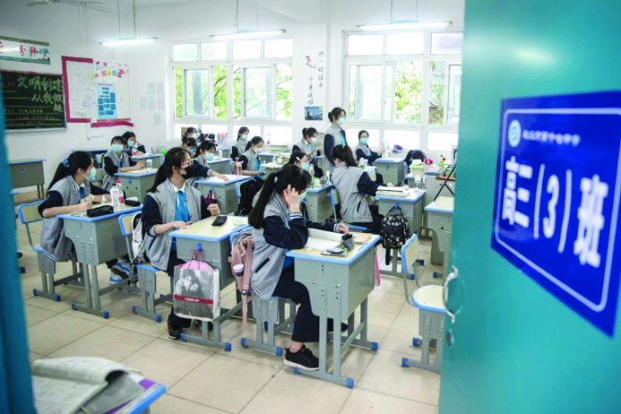 Senior school students returned to class in the central Chinese city of Wuhan