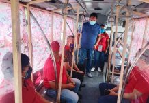 SOCIAL DISTANCING TEST. Officials of the Iloilo City government’s Public Safety and Transportation Management Office inspect the interior of a modern jeepney. They are shown here trying to observe social distancing. Yes, it’s possible, they say. IAN PAUL CORDERO/PN