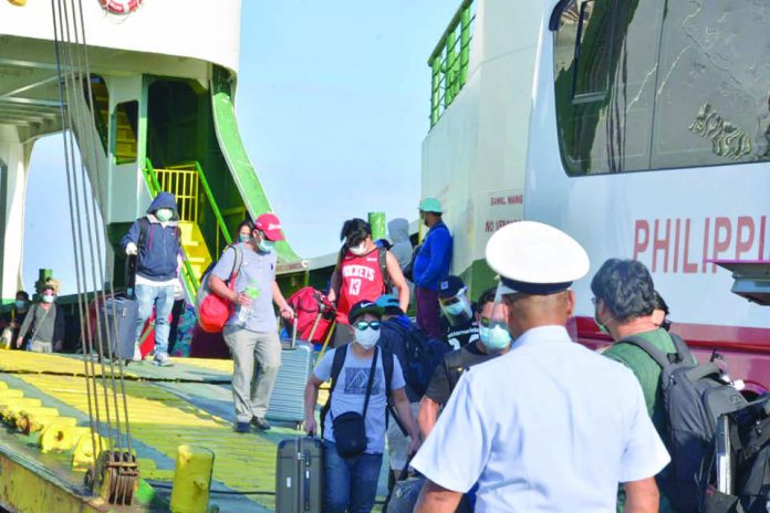 Thirty-five Negrense overseas Filipino workers (OFWs) arrive at the Barcelona port in Escalante City, Negros Occidental from Tabuelan, Cebu last month through a vessel ride.