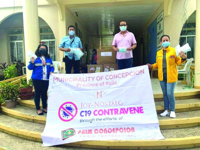 Palm Concepcion Power Corporation donates boxes of surgical masks to the Iloilo City government.
