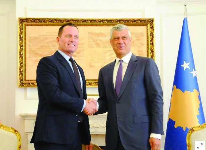 United States special envoy Richard Grenell (left) is welcomed by Kosovo President Hashim Thaci in Pristina, Kosovo, October 9, 2019.