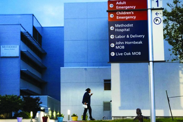 A health care worker arrives at Methodist Hospital in San Antonio, June 28, 2020. A health care worker arrives at Methodist Hospital in San Antonio, June 28, 2020. Texas hospital says a 30-year-old man who believed the coronavirus was a hoax and attended a “COVID party” died after being infected with the virus. THE NEW YORK TIMES