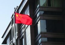China state media blasts Houston consulate shutdown China’s national flag is seen waving at the China Consulate General in Houston, Texas. FILE PHOTO/REUTERS