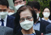 Lee Myung-hee, the widow of former Korean Air Chairman Cho Yang-ho leaves the Seoul Central District Court in Seoul, South Korea, Tuesday, July 14, 2020. AP
