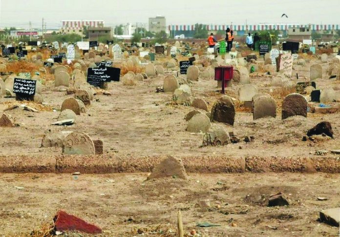 Mass grave found south of Khartoum, Sudan. Members of a forensic team at a first mass grave found south of Khartoum, Sudan.