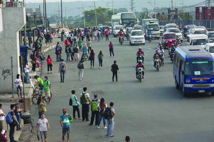 Metro Manila dealing with limited public transportation under GCQ President Rodrigo Duterte says the Philippines needs to be cautious in reviving the economy as it cannot afford a second wave of COVID-19 infections. Photo shows bustling Metro Manila dealing with limited public transportation under the general community quarantine. RAPPLER