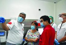 Bacolod City Mayor Evelio Leonardia (3rd from left), his wife Elsa, and Vice Mayor El Cid Familiaran (right) check out some of the equipment at the Corazon Locsin Montelibano Memorial Regional Hospital Biosafety Molecular Laboratory during a familiarization tour on July 7. The P20-million bio-lab funded by the city government is set to open on July 11. BACOLOD CITY PIO