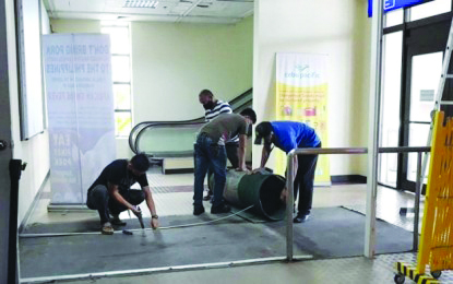 Personnel of the Negros Occidental Provincial African swine fever (ASF) Task Force set up additional biosecurity measures at the Bacolod-Silay Airport in Silay City in June. Personnel of the Negros Occidental Provincial African swine fever (ASF) Task Force set up additional biosecurity measures at the Bacolod-Silay Airport in Silay City in June. The province has remained ASF-free amid the coronavirus disease 2019 pandemic, a report from the Provincial Veterinary Office said on July 9. PROVINCIAL ASF TASK FORCE-NEGROS OCCIDENTAL VIA PNA