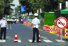China takes over US consulate in Chengdu Police stand at a cordon near the U.S. Consulate General in Chengdu, Sichuan province, China, July 27, 2020, as a deadline is due to expire for the departure of the final group of U.S. personnel from the consulate after China ordered its closure in response to a U.S. order for China to shut its consulate in Houston. REUTERS