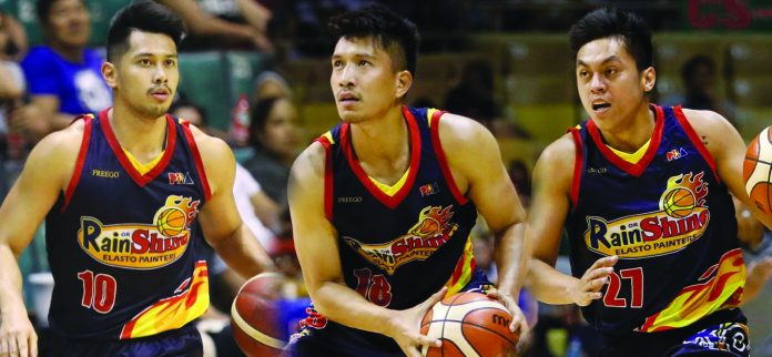 Rey Nambatac (right) and Javee Mocon (left) consider Escalante City-native Jame Yap (center)