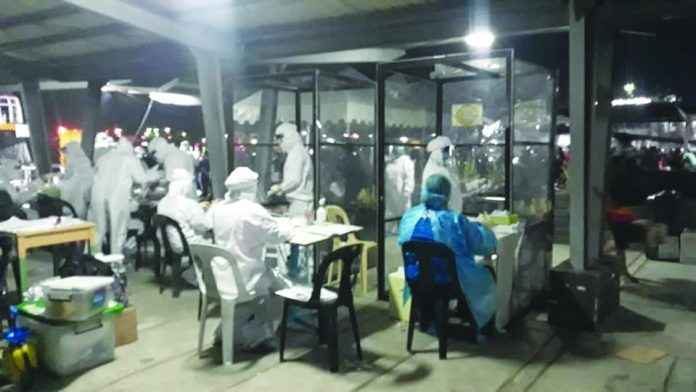 The Provincial Health Office sets up coronavirus virus disease 2019 swab sampling booths The Provincial Health Office sets up coronavirus virus disease 2019 swab sampling booths for arriving Negrenses at the Bredco port over the weekend. More than 1,000 locally stranded individuals arrived in Negros Occidental between July 17 and 19. PROVINCIAL GOVERNMENT OF NEGRO OCCIDENTAL VIA PNA