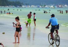 Malay LGU to shorten Boracay curfew hours Tourists enjoy their time in the world famous Boracay Island in Malay, Aklan in this undated photo. Acting Malay mayor Floribar Bautista said they will reduce the curfew hours in the world-class island resort. BOY RYAN ZABAL/AKEAN FORUM