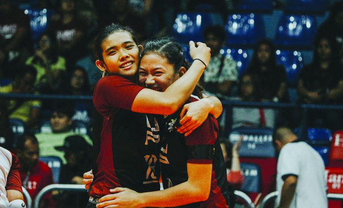 Volleybelles Diana Carlos (left) and Maria Lina Molde (right) of the University of the Philippines can still represent the colors of the school in University Athletic Association of the Philippines Season 83. UPWVT PHOTO