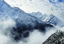 Nepal to resume flights Agence France-Presse reporter Ammu Kannampilly (second from right) and Nepalese guide Pasang Sherpa stand on a ridge over a valley leading north into the Khumbu region as they try to get a clear view of Mt. Everest on April 18, 2015. AFP