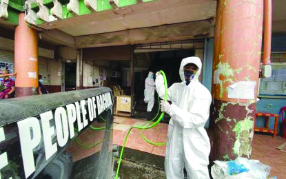 bacolod city disinfection Personnel of City Disaster Risk Reduction and Management Office prepare fumigants at the entrance of the old Bacolod City Hall. They disinfected the premises on Tuesday after an employee of one of the offices occupying the building tested positive for coronavirus disease. BACOLOD CITY DRRMO VIA PNA DISINFECTION.
