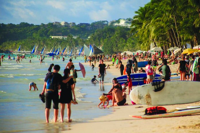 boracay Tourists flood Boracay Island in Malay, Aklan before it was closed earlier this year due to coronavirus disease 2019. Malacañang is urging Western Visayas tourist to spend time in the world-class island which reopened on June 16. SOUTH CHINA MORNING POST
