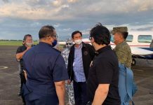 Environment secretary Roy Cimatu (center) and Presidential Assistant for the Visayas Michael Lloyd Dino (second from right) arrive in Bacolod City on Wednesday. After a long day in Iloilo, where the delegation hopped to various meetings with Regional Inter-agency Task Force of Region VI and Local Chief Executives, the Cabinet officials will continue their meetings in Bacolod. OPAV