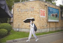 China sentences Canadian to death on drug charges A woman wearing a face mask to help protect against the coronavirus walks past the Canadian Embassy in Beijing, Thursday, Aug. 6, 2020. AP