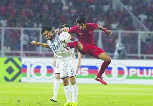 An Indonesian Merah Putih player jumps on Ilonggo Jovin Bedic of the Philippine Azkals during their 2018 AFF Suzuki Cup match An Indonesian Merah Putih player jumps on Ilonggo Jovin Bedic of the Philippine Azkals during their 2018 AFF Suzuki Cup match. AFF SUZUKI CUP
