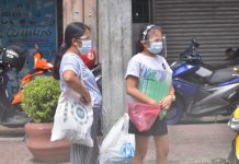 Doctors call for strict observance of health protocols Aside from face masks, these women wear face shields while waiting for a jeepney ride in Iloilo City’s downtown area. Starting today, passengers of any mode of public transportation are required to wear face shield for protection against coronavirus disease 2019. IAN PAUL CORDERO/PN