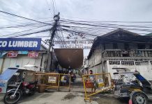 Selective lockdown eyed for 12 more city brgys Barricades block the entrance of Barangay Pala-Pala 1 in Iloilo City on Monday. The village has four cases of coronavirus disease 2019. IAN PAUL CORDERO