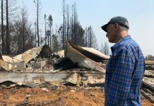 Evacuations lifted near California fires Charles Christianson, a 67-year-old retired school teacher returns to his destroyed home after a wildfire in Guerneville, Calif. on Tuesday, Aug. 25, 2020. AP PHOTO/ARON RANEN