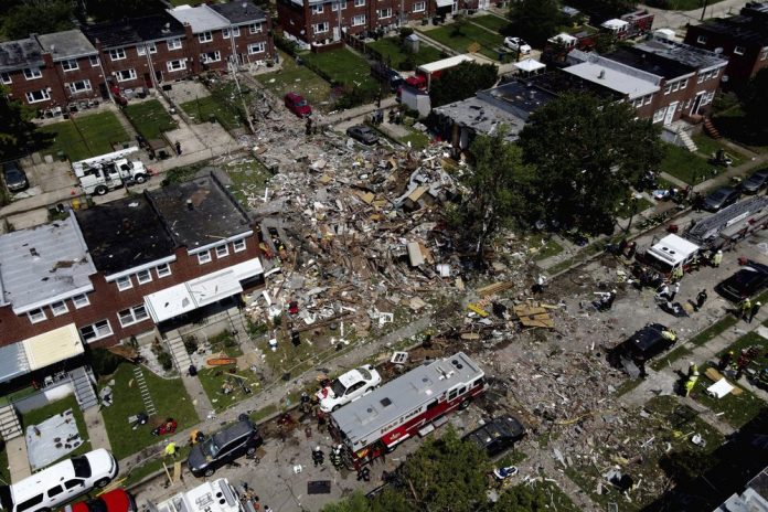 Debris and rubble covers the ground in the aftermath of an explosion in Baltimore on Monday Debris and rubble covers the ground in the aftermath of an explosion in Baltimore on Monday, Aug. 10, 2020. AP