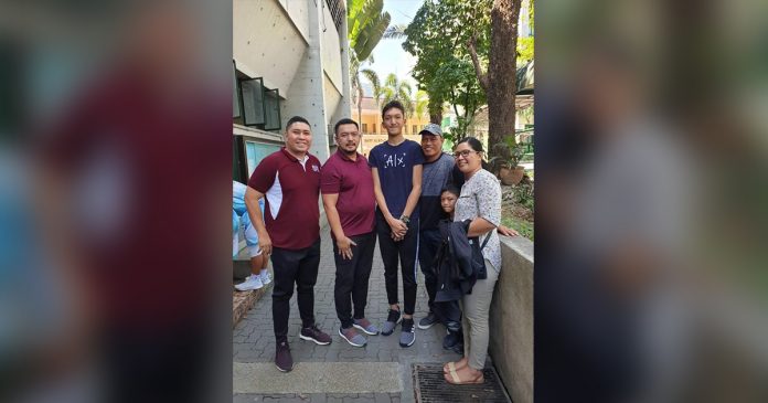 Heinz Gabriel Demisana Heinz Gabriel Demisana was flanked by his relatives, UPIS team manager Dale Villajuan and UP Fighting Maroons head coach Dolreich Perasol. CONTRIBUTED PHOTO