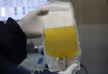 UN warns: Virus plasma treatment still experimental In this Friday, June 12, 2020 file photo, a doctor holds a bag of blood plasma donated by a COVID-19 survivor at blood bank in La Paz, Bolivia. AP
