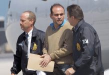 Warlord’s release from US prison ups tension In this May 13, 2008 file photo, Colombian paramilitary warlord Salvatore Mancuso is escorted by U.S. DEA agents upon his arrival to Opa-locka, Florida. AP