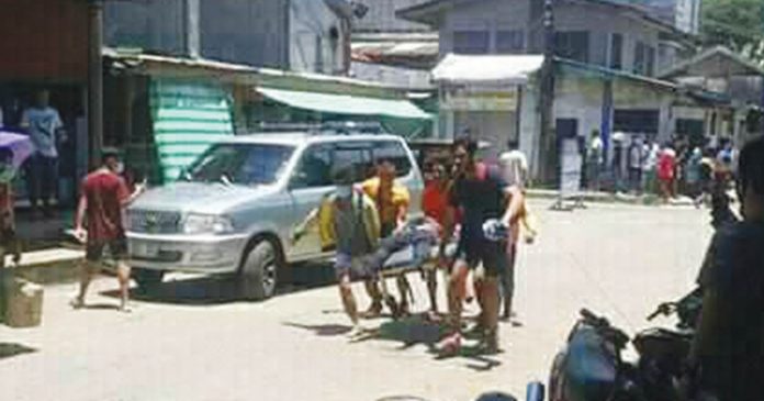 JoloBombing Casualties are evacuated after an explosion has ripped Barangay Walled City in Jolo, Sulu on Monday. TAUSUG HIMUMUNGAN FACEBOOK