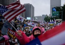 SoKor warns of another COVID-19 outbreak tied to church Members of conservative and religious Christian groups during an antigovernment rally in Seoul, South Korea on Saturday. AFP/GETTY IMAGES