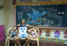 Mitchelle “Bon” Silaya holds classes to his children Alfonzo and Brianna inside their quarantine facility at a public elementary school in Bago City, Negros Occidental on Aug. 10. BON SILAYA