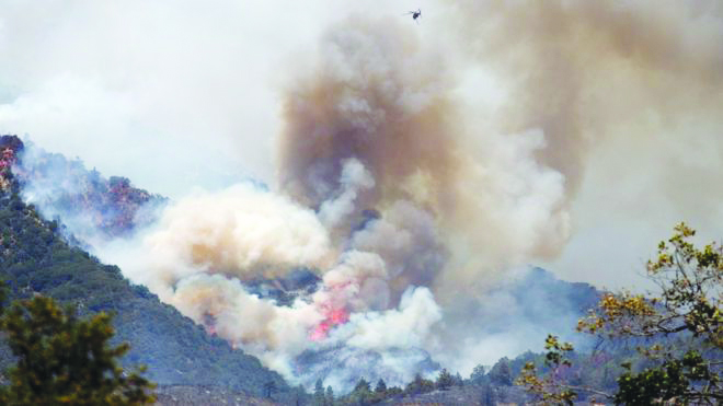 More than 1,300 firefighters are fighting the blaze with help from aircraft More than 1,300 firefighters are fighting the blaze with help from aircraft. EPA
