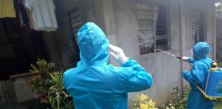 Municipal Disaster Risk Reduction and Management Office personnel disinfect houses in Barangay Espinosa, Jordan, Guimaras on Monday. The village is on a lockdown beginning yesterday, Aug. 17, until Aug. 20. LGU MAYOR RUBEN CORPUZ