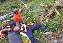 Local officials race against time to save injured personnel of the Bureau of Fire Protection after their truck lost its brakes and veered 20 meters off the road in Barangay Salvacion, Sibalom, Antique on Wednesday. Top photo shows the wreckage of the ill-fated fire truck. Heavy damage is seen on its front portion. RUBY GABION